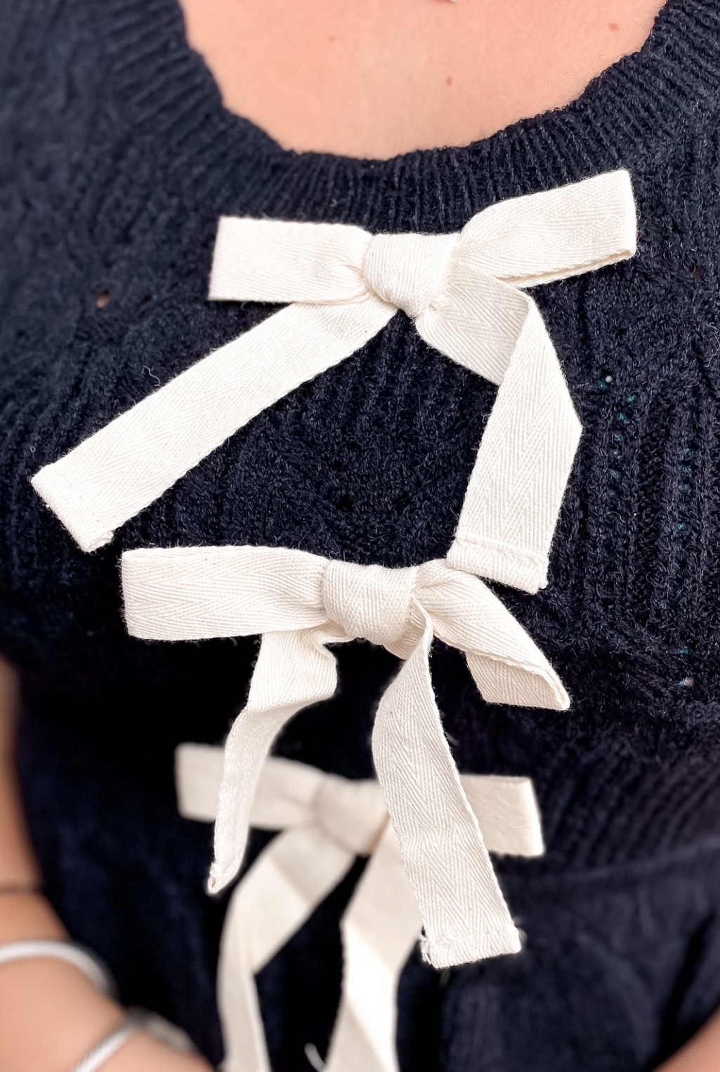 Z Ruffle Hem Cropped Bow Sweater