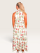 Tucker Brown Zinnia floral print maxi dress with a halter neckline and button closure, viewed from the back.