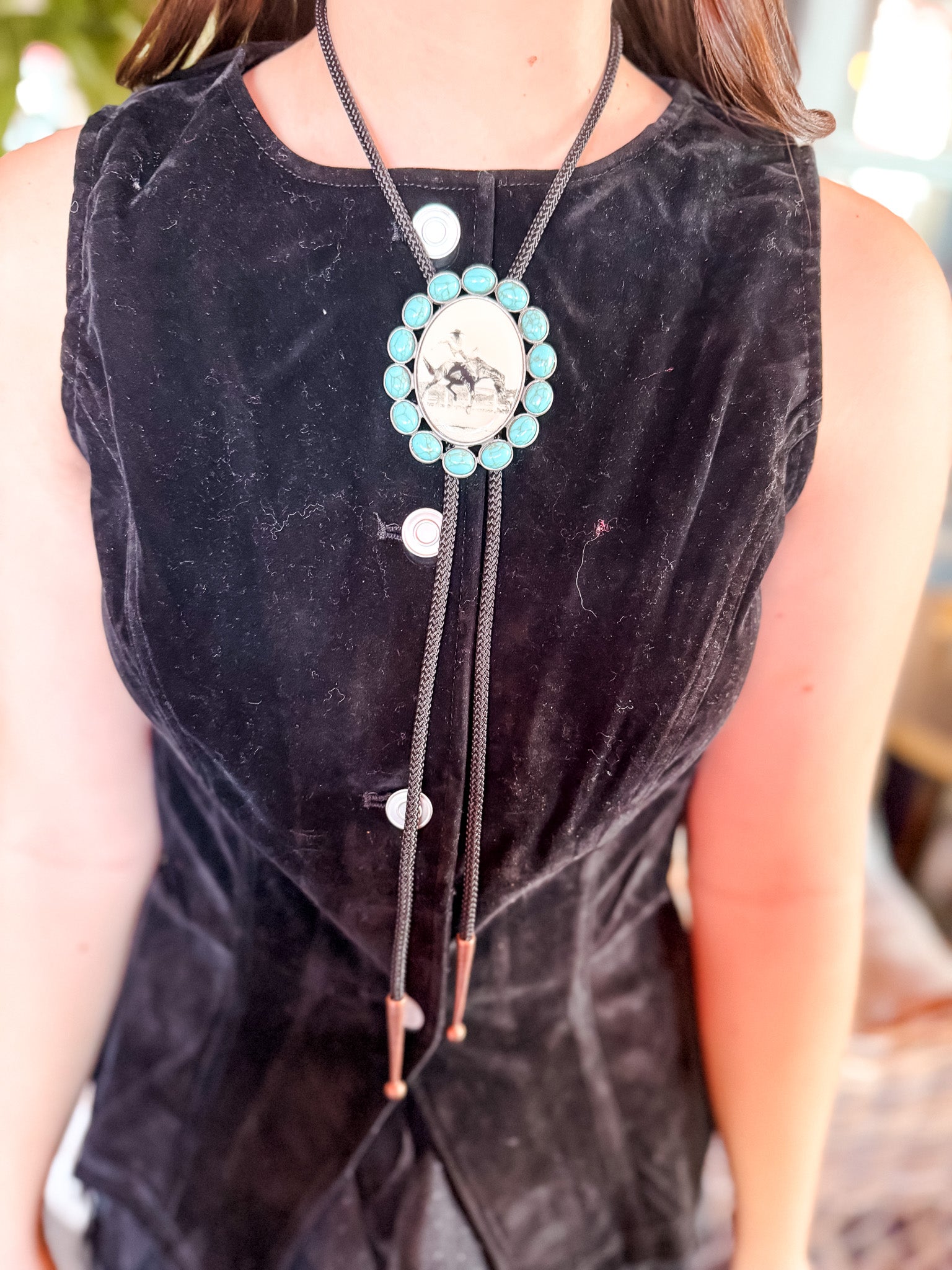 Cowboy Bull Riding Bolo Tie with Turquoise Stones, each