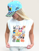 Tucker Brown white boxy tank top featuring a colorful game day dog collage graphic worn by a blonde woman