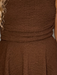 Tucker Brown Ferrero crinkle romper in chocolate brown with a textured fabric finish and gathered waist detail